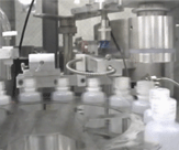 Click for full video of AMT Filling and Capping Monoblock Machine